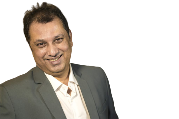Uday Shetty smiling, candid studio portrait
